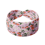 You Pick 'Em pink headband featuring blooming strawberry plants, crafted from a buttery-soft, ultra-stretchy poly-knit blend, designed for reliable non-slip comfort.