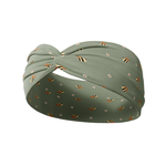 Cute As Can Bee green headband featuring tiny bees and daisies, crafted from a buttery-soft, ultra-stretchy poly-knit blend, designed for reliable non-slip comfort.