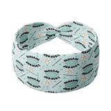 A blue headband featuring surgical tools and floral design. Functional and stylish for confidence and comfort. Versatile 3-in-1 twist style, sweat-absorbent, and non-slip. Designed in Springfield, MO.