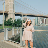Woman wearing an I Heart NY headband, showcasing its versatile, non-slip design from The Sarah Wallace Collection.