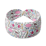 A versatile white headband with a twisted knot and physical therapy themed pattern, designed for confidence and functionality. Features a twist style, sweat-absorbent fabric, and machine washable poly-knit blend.