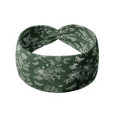 Arwen Floral headband featuring a deep forest band with white floral and butterfly design design, crafted from a buttery-soft, ultra-stretchy poly-knit blend, the most comfortable hair accessory ever.