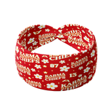 Karma Is the Guy on the Chiefs headband: red headband with white "karma is the guy on the Chiefs" text and daisies, ultra-stretchy poly-knit, non-slip, versatile twist style for various wear options.