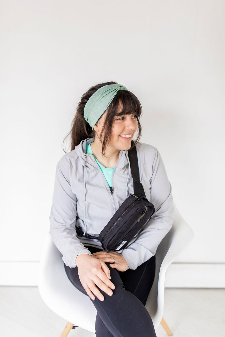 Adult women's sage headband with dark sage tribal triangles made of lines going different directions