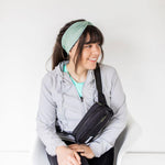 Adult women's sage headband with dark sage tribal triangles made of lines going different directions