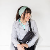 Adult women's sage headband with dark sage tribal triangles made of lines going different directions