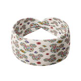 An EST. 1923 versatile white headband with floral Mickey Mouse ears design, ultra-stretchy poly-knit blend, non-slip, perfect for workouts or play, one size fits most.