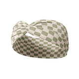 Olive Patch checkered headband featuring a sage and tan checkered design, crafted from a buttery-soft, ultra-stretchy poly-knit blend, the most comfortable hair accessory ever.
