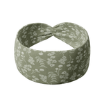 Hazel Floral dark sage headband with white pressed flower design, crafted from a buttery-soft, ultra-stretchy poly-knit blend, the most comfortable hair accessory ever.
