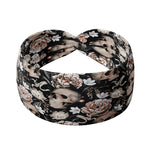 Adult women's black headband with allover artisticly painted human skulls, white peony flowers, other smaller white flowers and butterflies