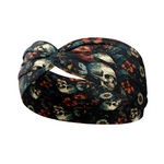 Adult women's black headband with various red, white, blue and green flowers and greenery with shadowed skulls