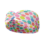 Adult women's white headband with bright purple, pink, teal, coral and purple smiley faces and tiny stars