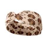 Adult women's tan headband with allover cartoon turkeys