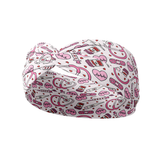 You Give Me Tachycardia white headband with pink pill bottle, stethoscopes, needles and hearts, designed for versatility and comfort with a stretchy, ultra-soft fabric.