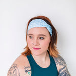 Adult women's light blue headband with blue leaves