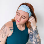 Adult women's light blue headband with blue leaves