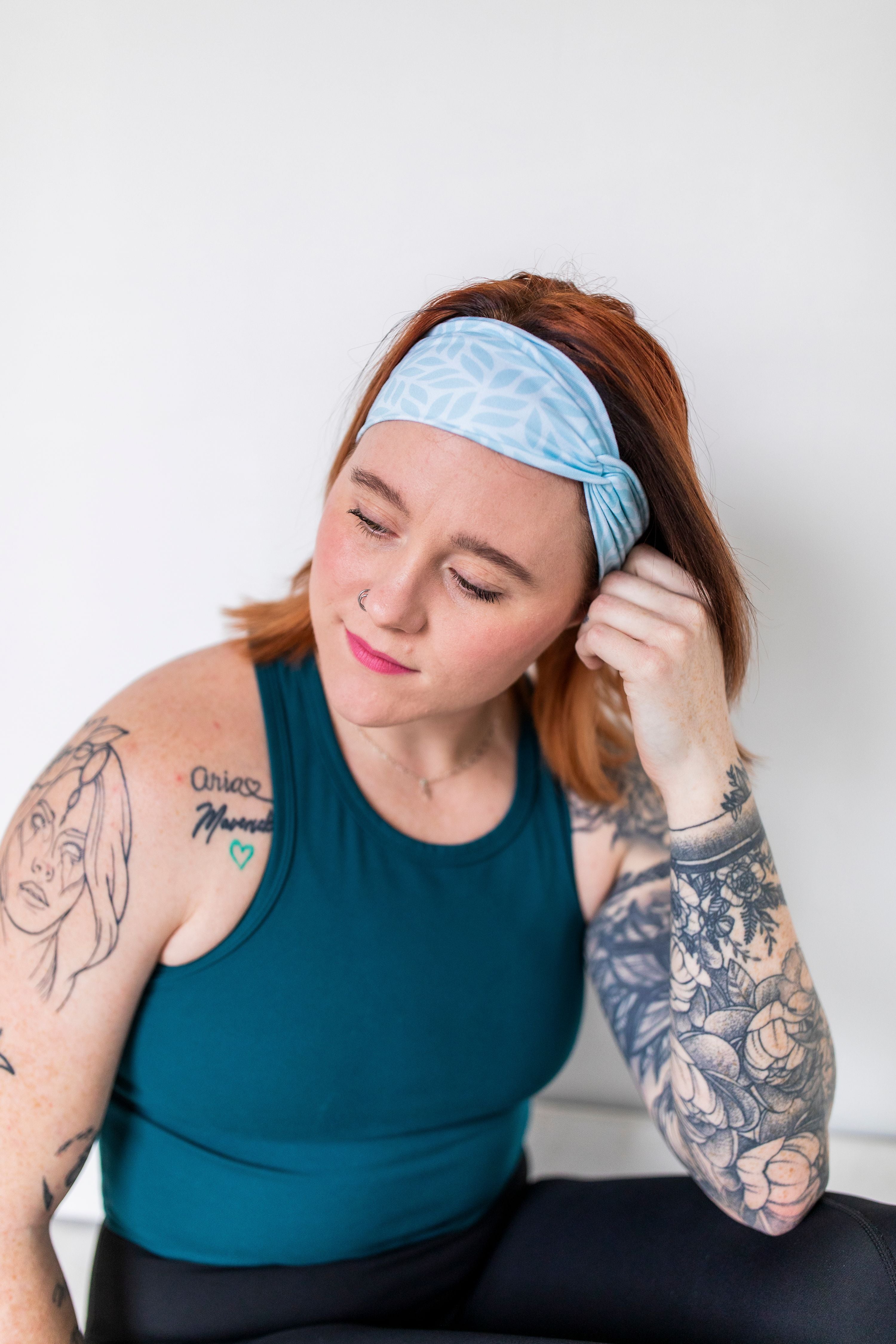 Adult women's light blue headband with blue leaves