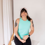 Adult women's white headband with orange, slate, tan, blush and plum pawprints, hearts and words they say "cat mom"