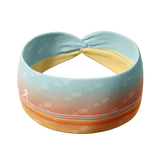 Adult women's gradient headband with yellow, orange and blue with allover white shoe prints, three yellow, orange and white horizontal lines and the white script saying "enjoy the miles"