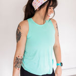 Adult women's white headband with orange, slate, tan, blush and plum pawprints, hearts and words they say "cat mom"