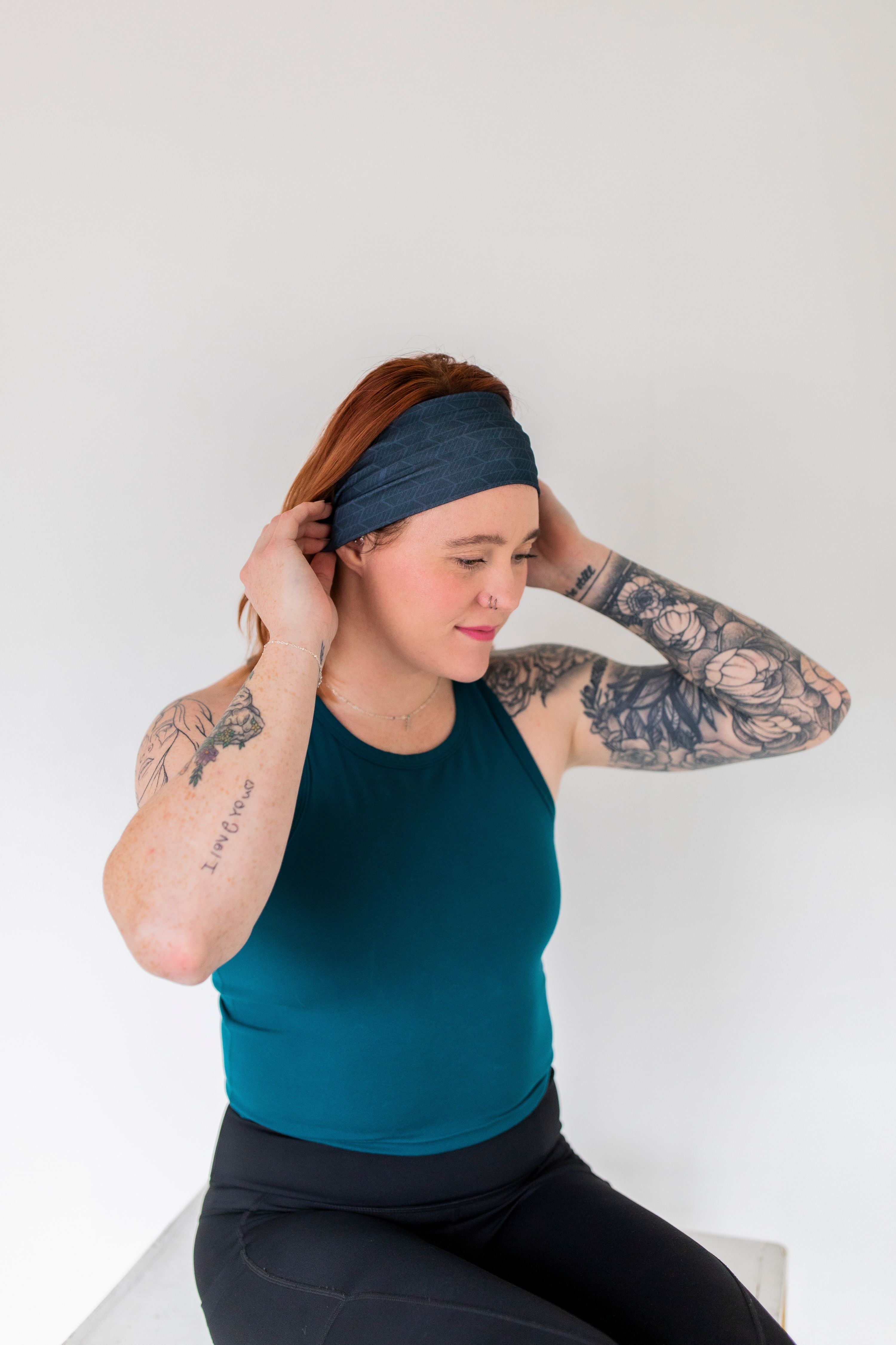 Adult women's onyx headband with off-black lines tribal lines and angles