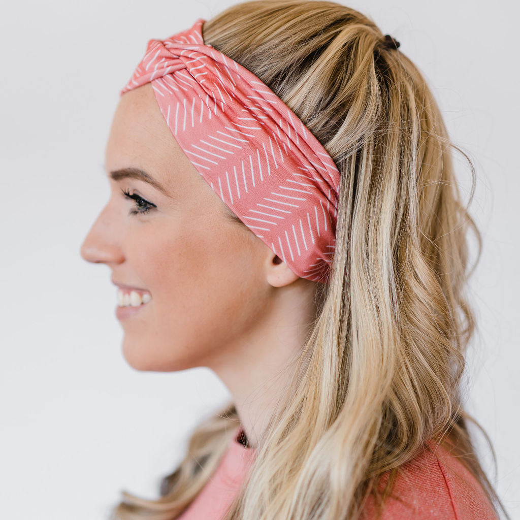 Adult women's coral headband with white slanted lines