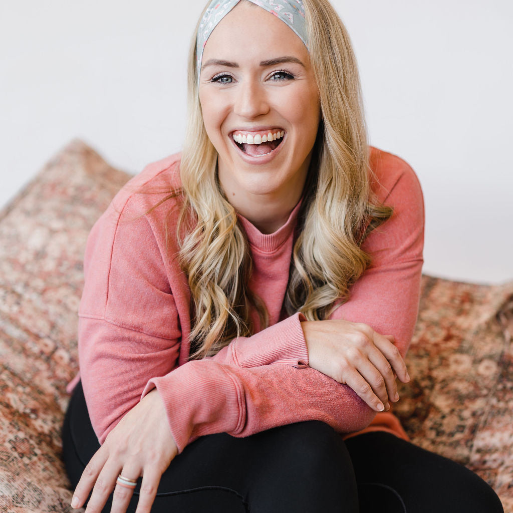Adult women's sage headband with small red poppies, pink and yellow flowers and the text "mama" with white floral pattern in the script