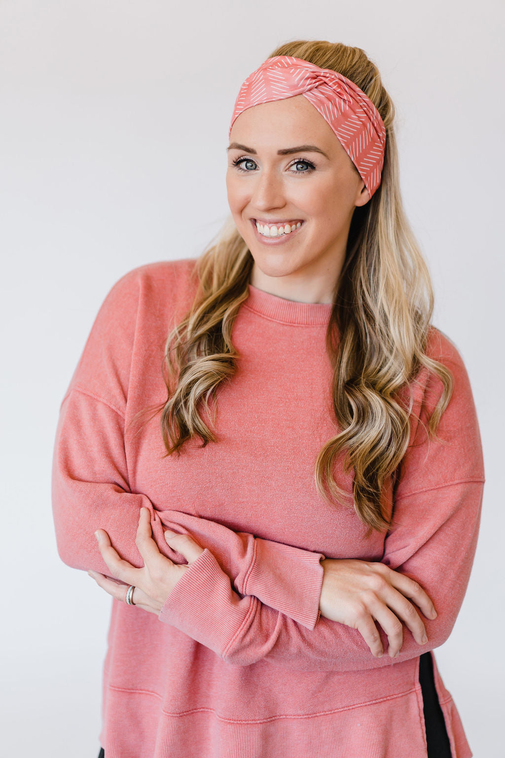Adult women's coral headband with white slanted lines