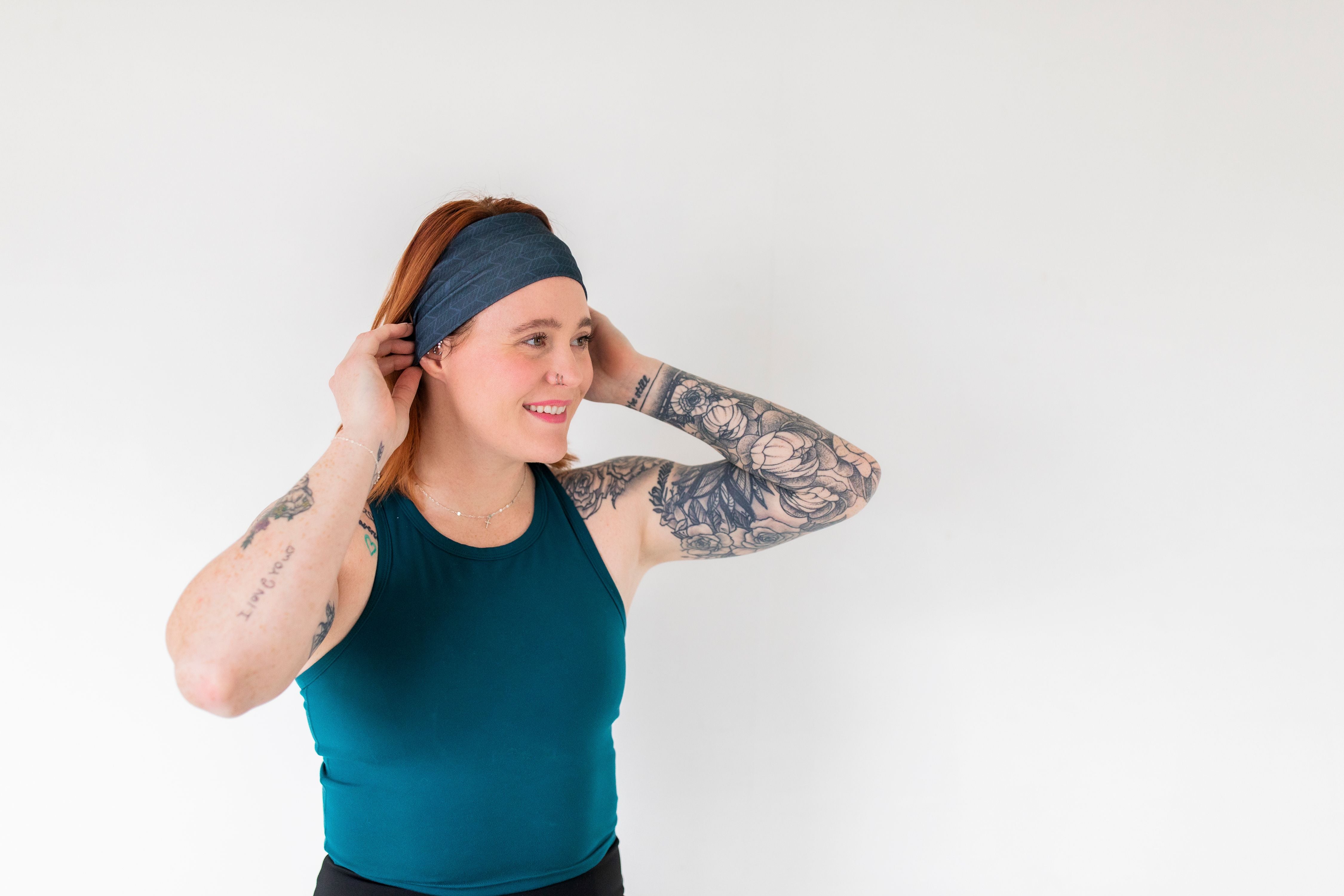 Adult women's onyx headband with off-black lines tribal lines and angles