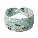 Adult women's aqua headband with drawn Scottish Terriers, Golden Retrievers, Corgis, Dalmations, Bulldogs, Dachsunsds, Weston Terrier and pink flowers allover