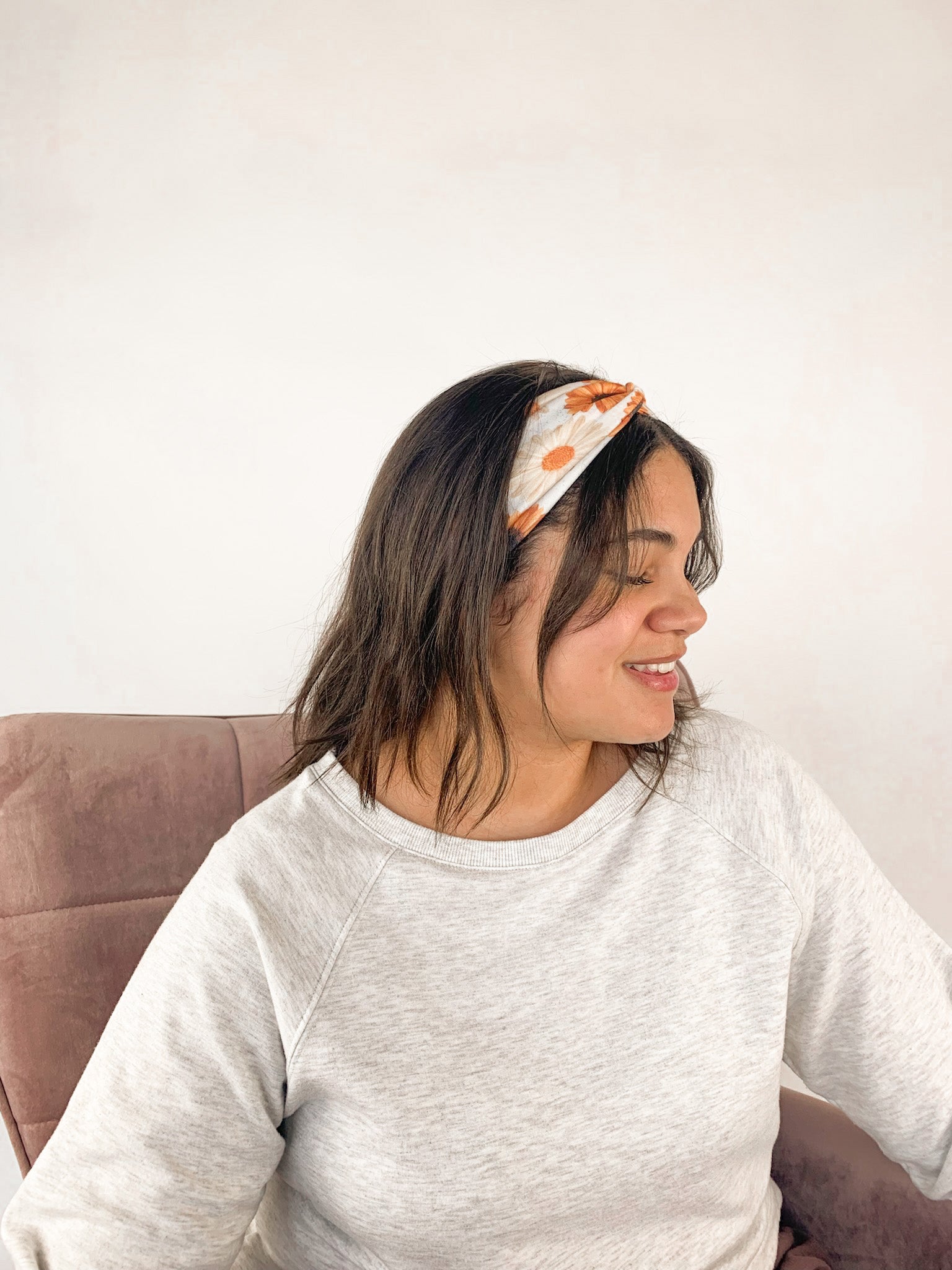 Adult women's white headband with large sunflower and daisy print