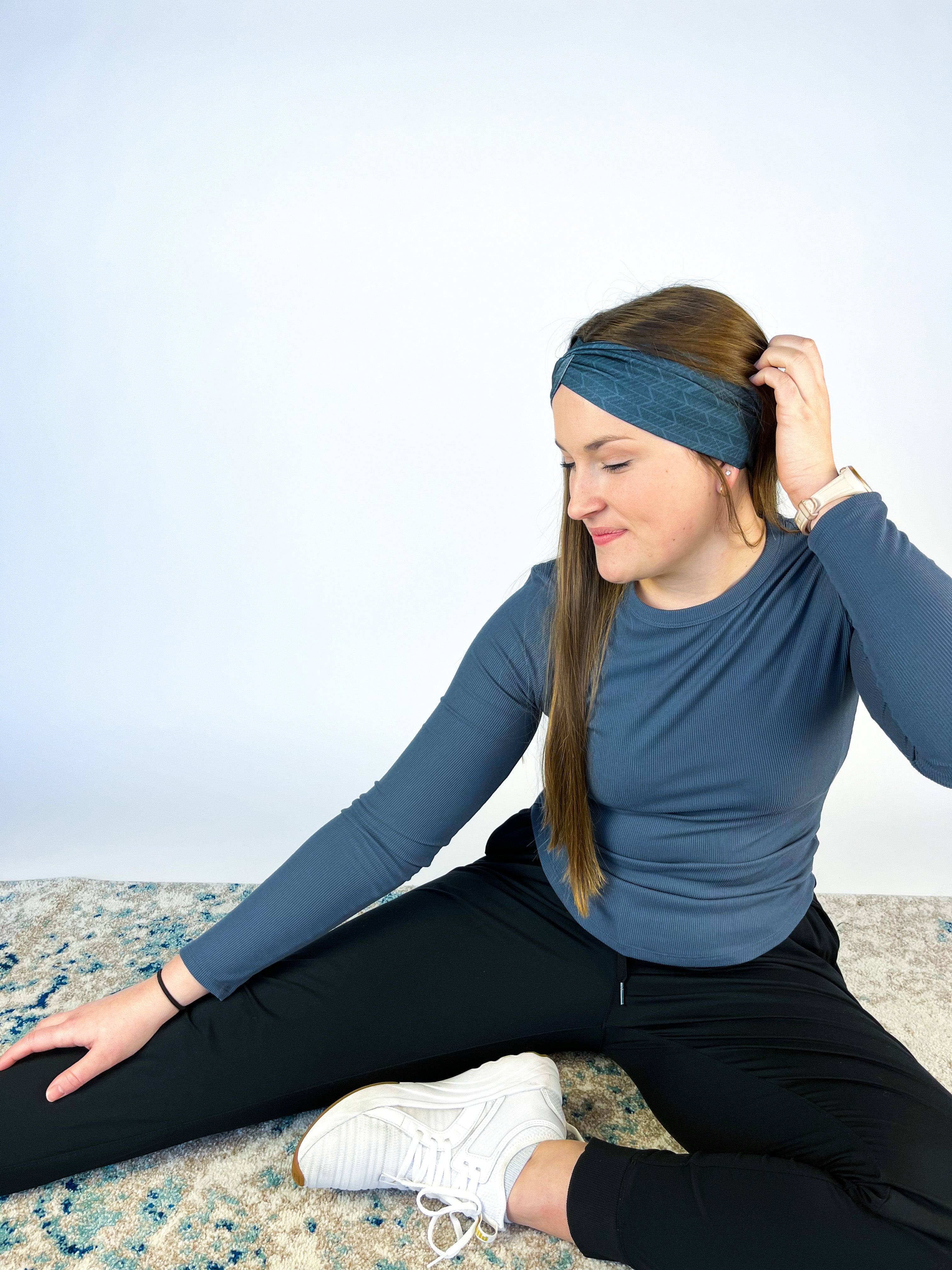 Adult women's onyx headband with off-black lines tribal lines and angles