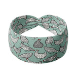 Adult women's light teal headband with allover black and white cartoon chicken print