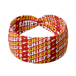 Adult women's red headband with yellow and white 1970's bubble script with the phrase "Chiefs" and an arrowhead