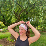 Adult women's ivory headband with soft pink, coral and green watercolor floral print