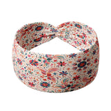 Adult women's ivory headband with pink, orange, blue, yellow and red small floral, sun and dot shapes