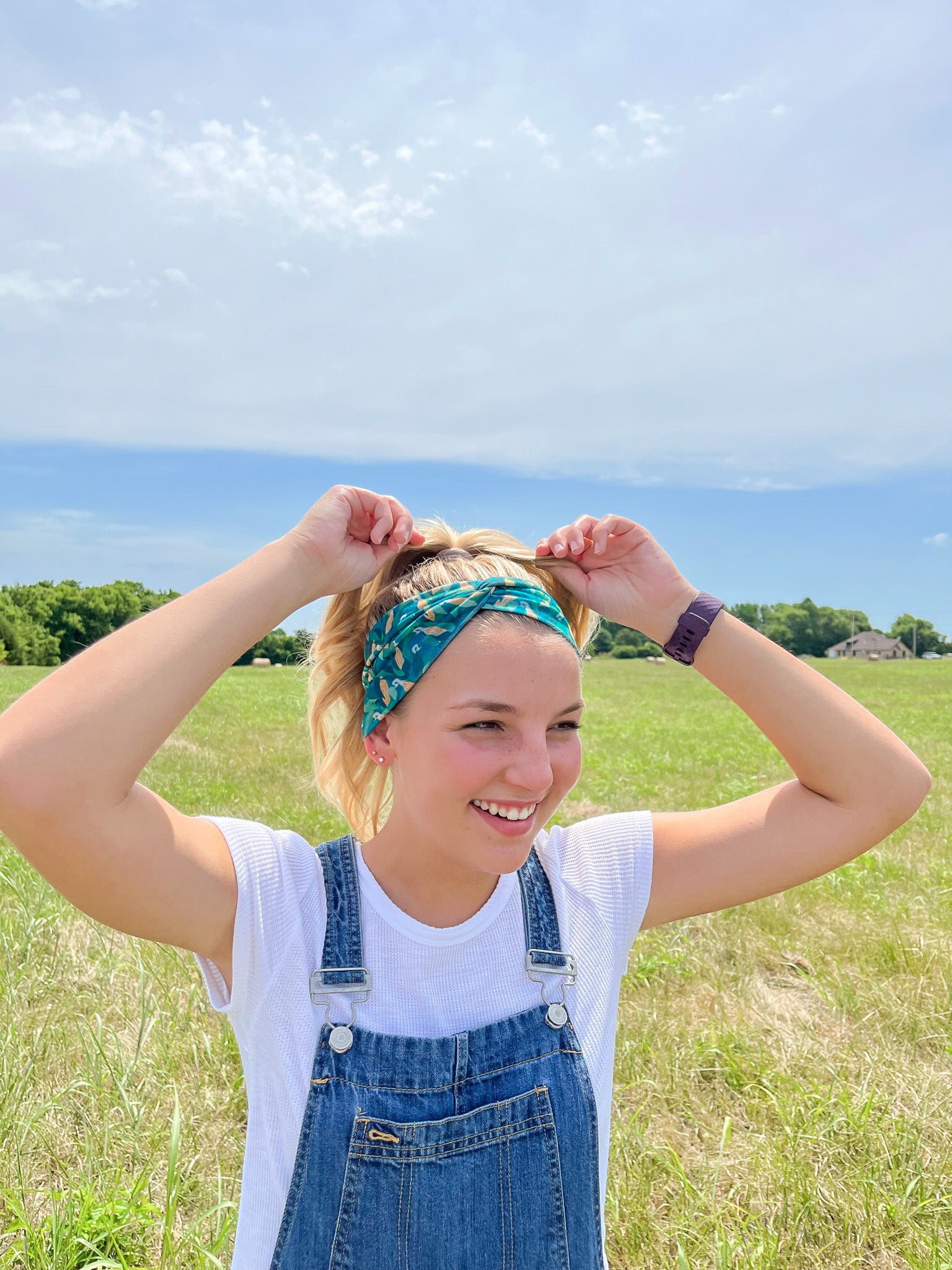 Adult women's dark green headband with yellow corn on the husk with different shades of green leaves