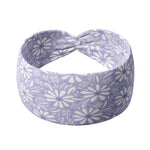 Adult women’s purple headband with medium white, dark and light purple floral allover pattern.