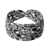 Adult women's black headband with allover white skulls and daisies print