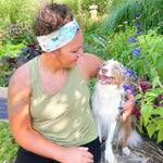 Adult women's aqua headband with drawn Scottish Terriers, Golden Retrievers, Corgis, Dalmations, Bulldogs, Dachsunsds, Weston Terrier and pink flowers allover