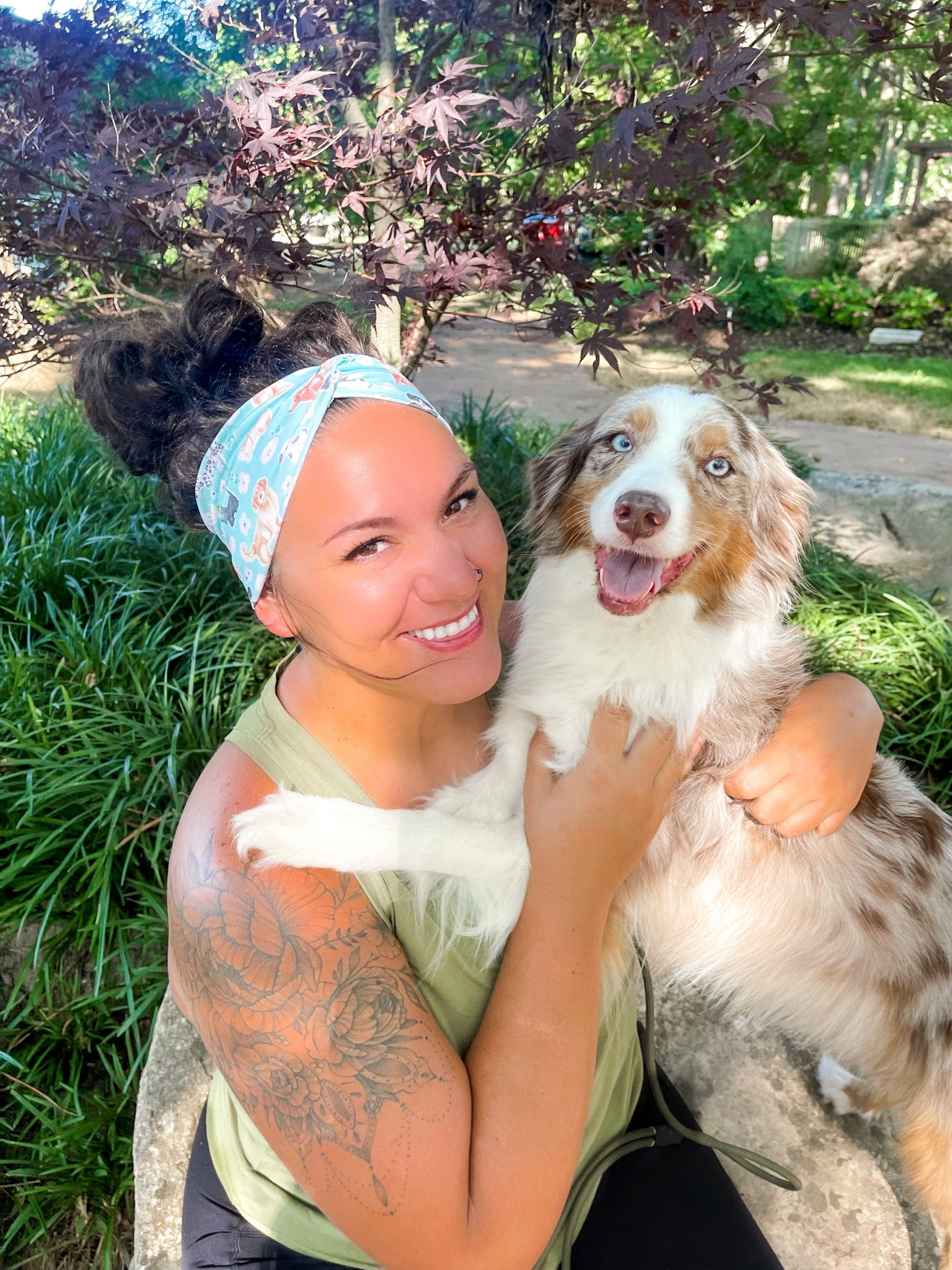 Adult women's aqua headband with drawn Scottish Terriers, Golden Retrievers, Corgis, Dalmations, Bulldogs, Dachsunsds, Weston Terrier and pink flowers allover