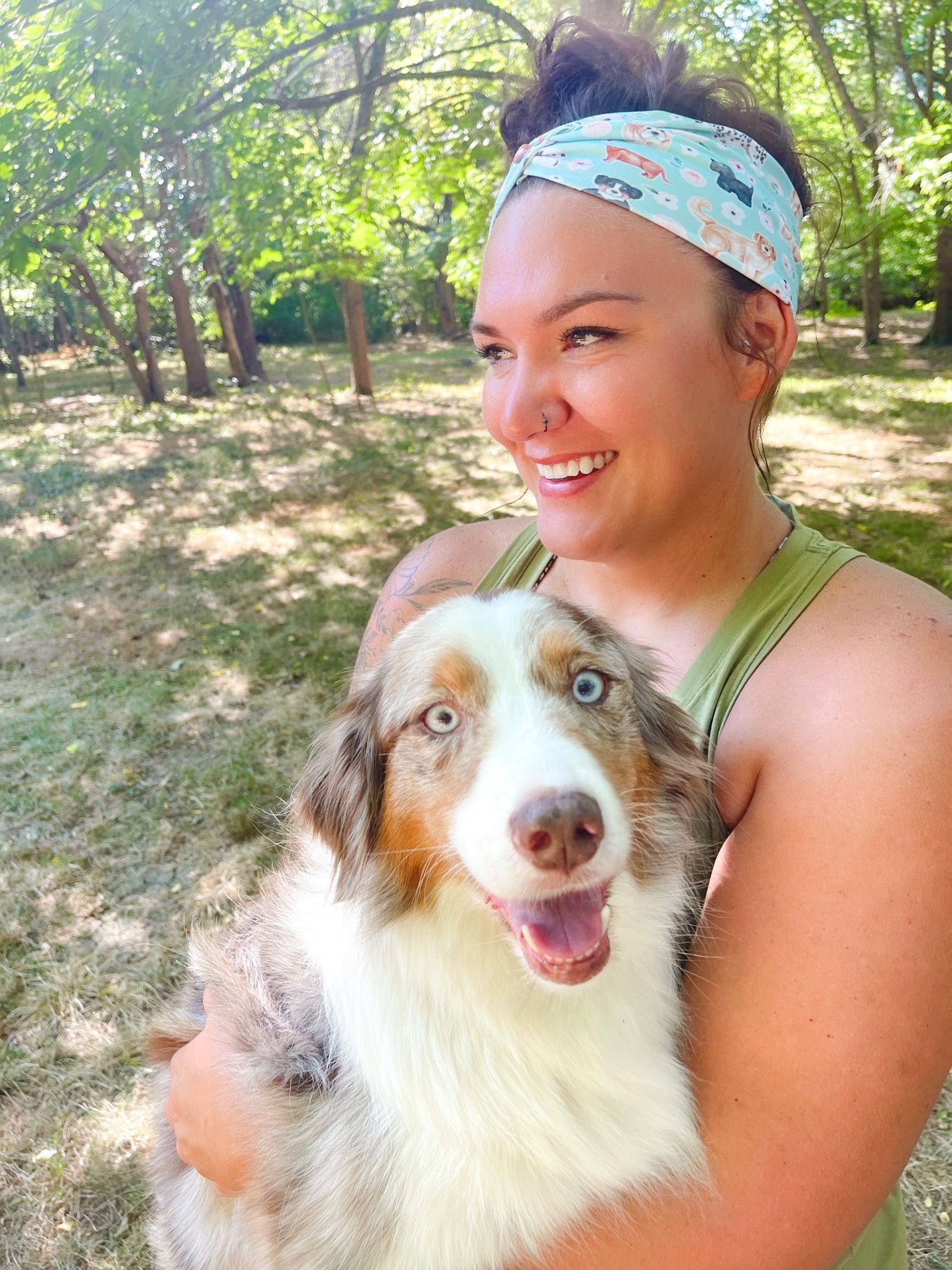 Adult women's aqua headband with drawn Scottish Terriers, Golden Retrievers, Corgis, Dalmations, Bulldogs, Dachsunsds, Weston Terrier and pink flowers allover