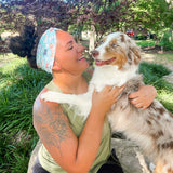 Adult women's aqua headband with drawn Scottish Terriers, Golden Retrievers, Corgis, Dalmations, Bulldogs, Dachsunsds, Weston Terrier and pink flowers allover