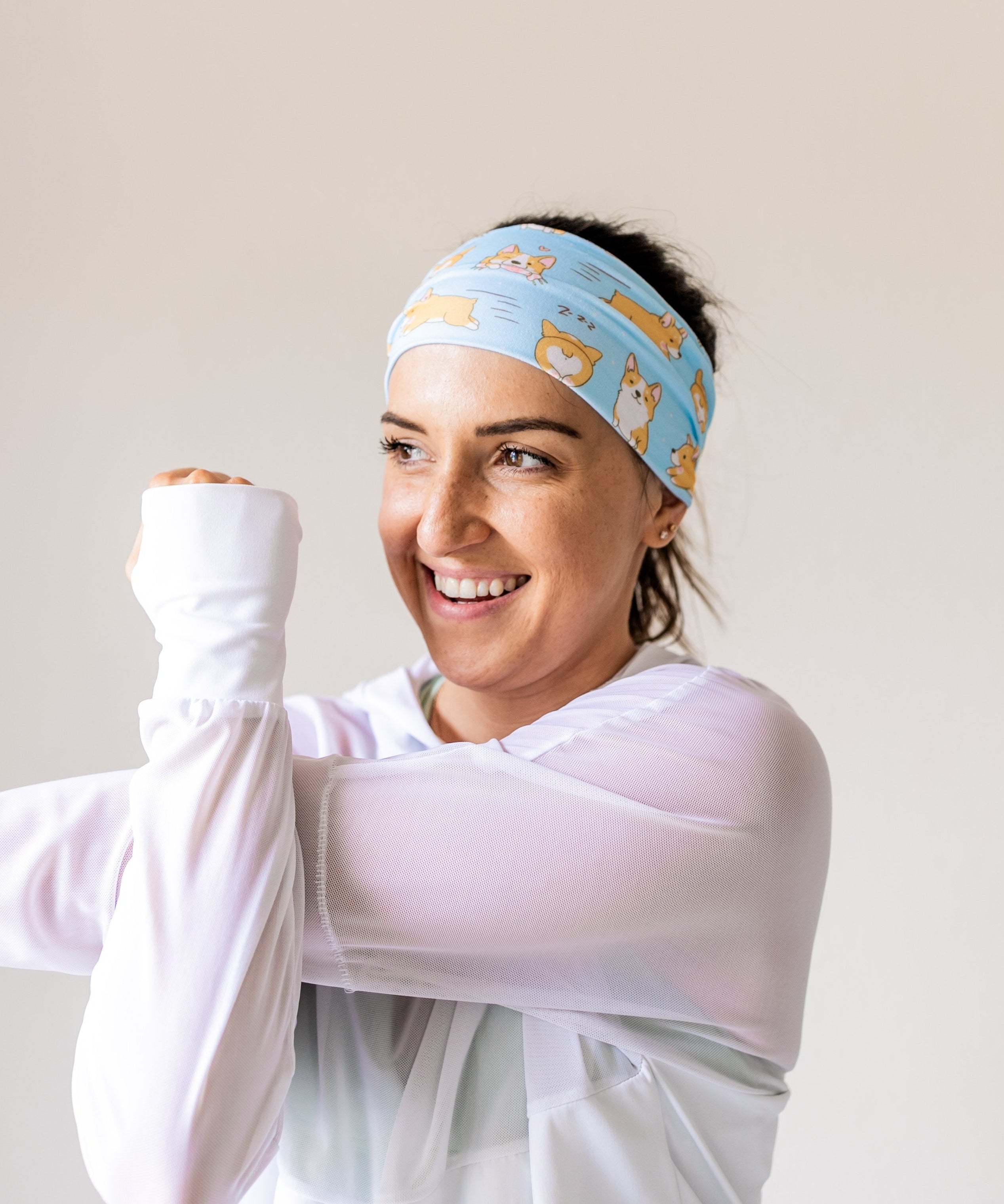 Adult women's light blue headband with cartoon Corgi dog print