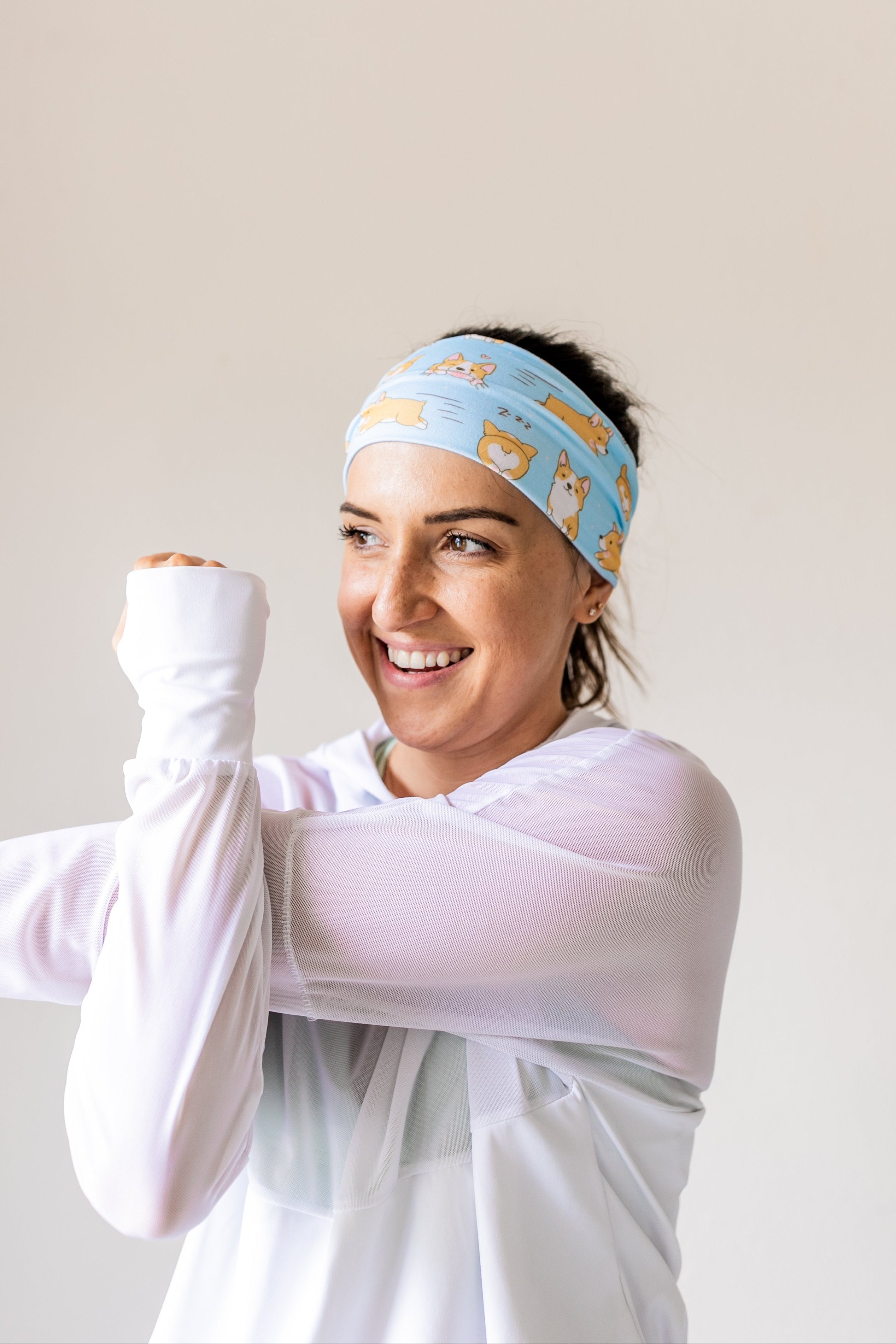 Adult women's light blue headband with cartoon Corgi dog print