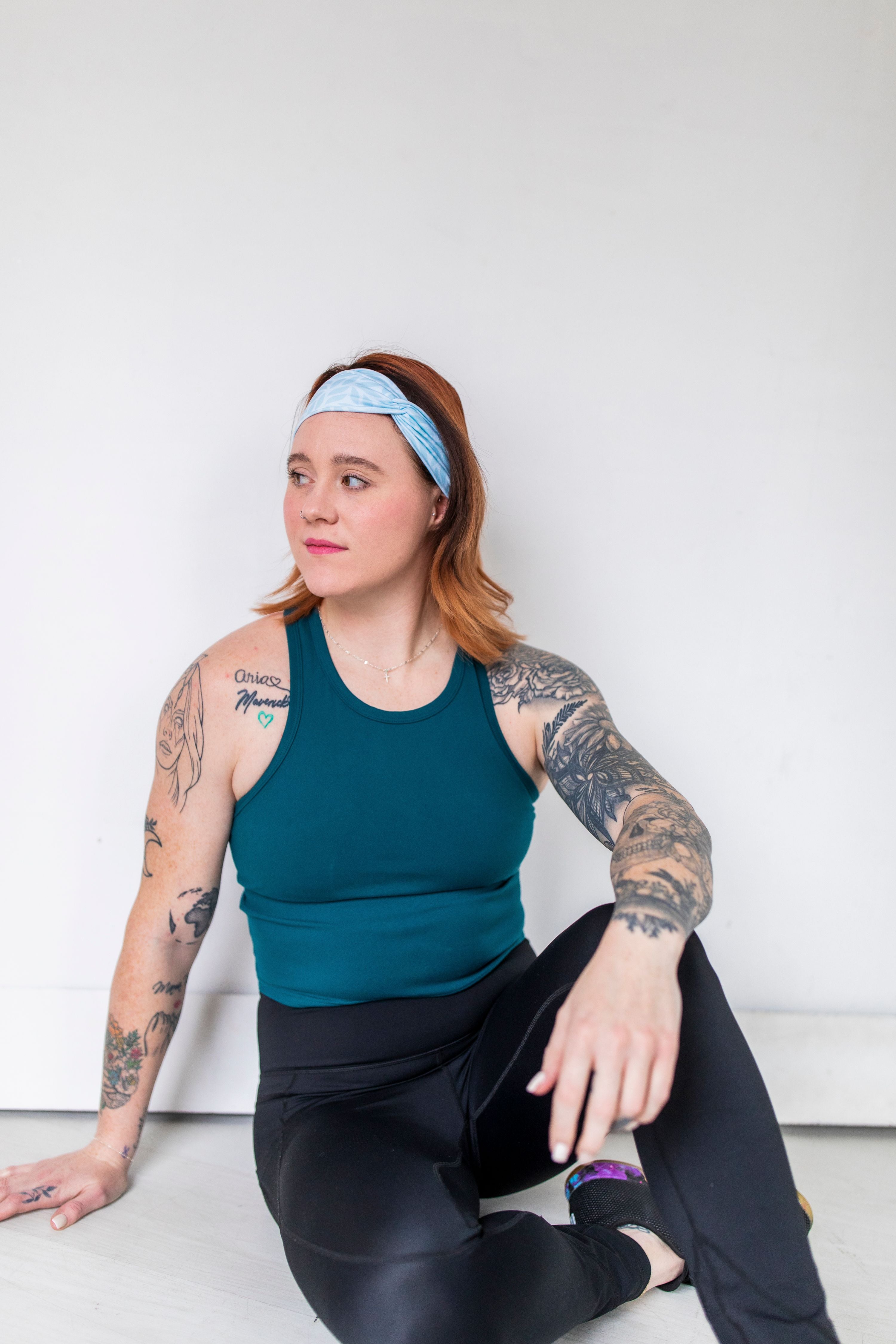 Adult women's light blue headband with blue leaves