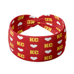 Adult women's red headband with white hearts and bright yellow "KC" pattern