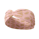 Adult women's pink headband with allover bandaid print