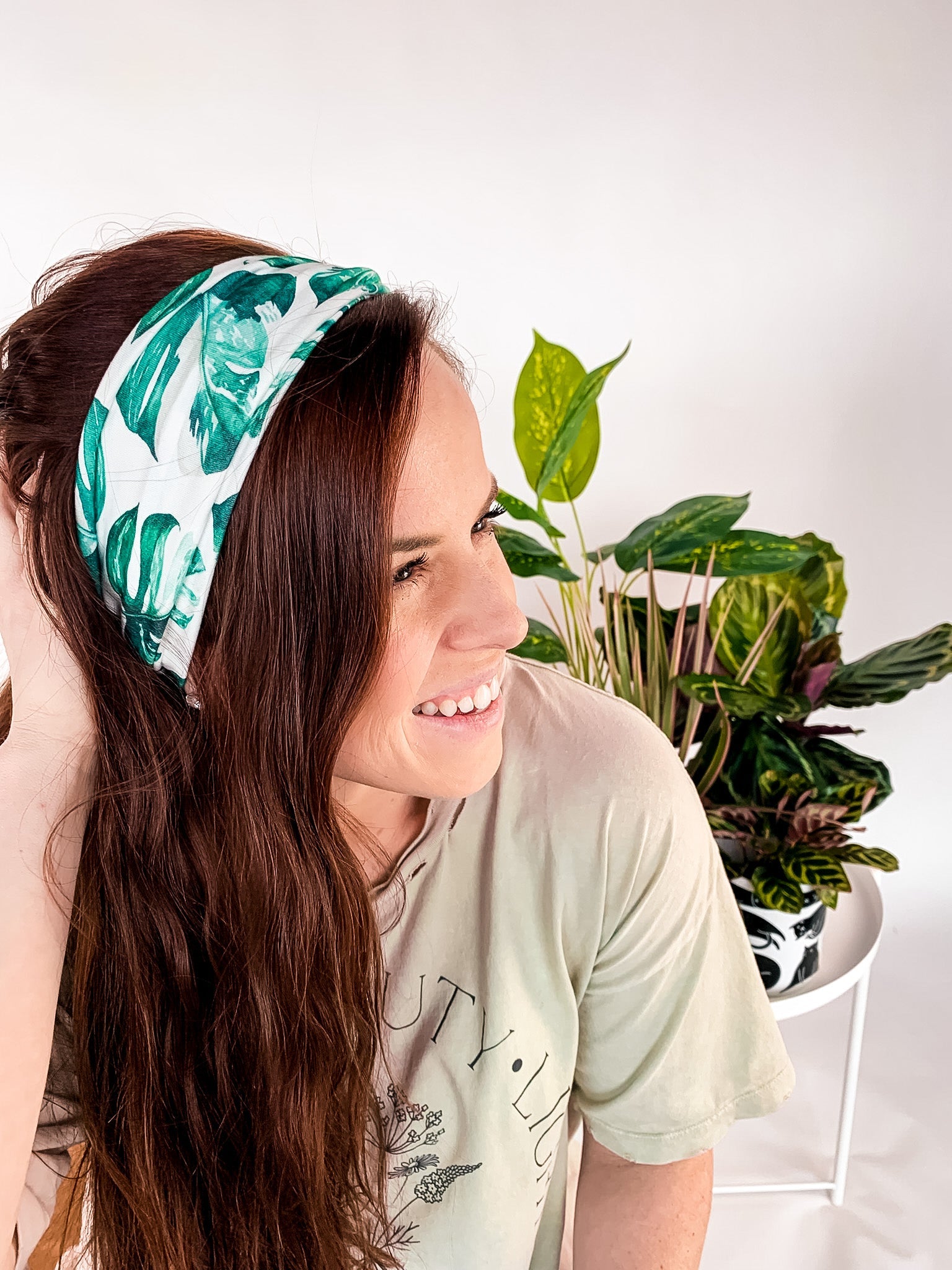 Adult women's white headband with large green leaf houseplant print