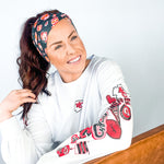 Adult women's black headband with yellow, red and white artistic cartoons of Patrick Mahomes, Avery Reid and Travis Kelce